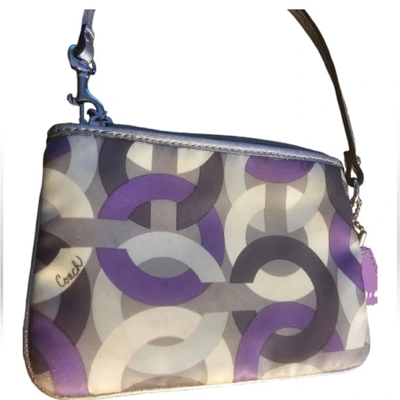 COACH Madison Graphic OP Art Small Silver and Purple Wristlet

Wristlet - Picture 3 of 6